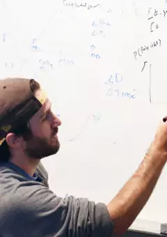 Man Writing On Board Mobile